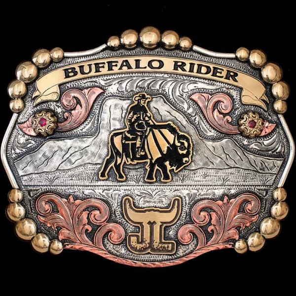 "Feel the Spirit of the Wild West with our Pawnee ""Buffalo Rider"" belt buckle. This stunning buckle is crafted on a hand-engraved, German Silver base with a mountain landscape background element. It is detailed with Jeweler's Br